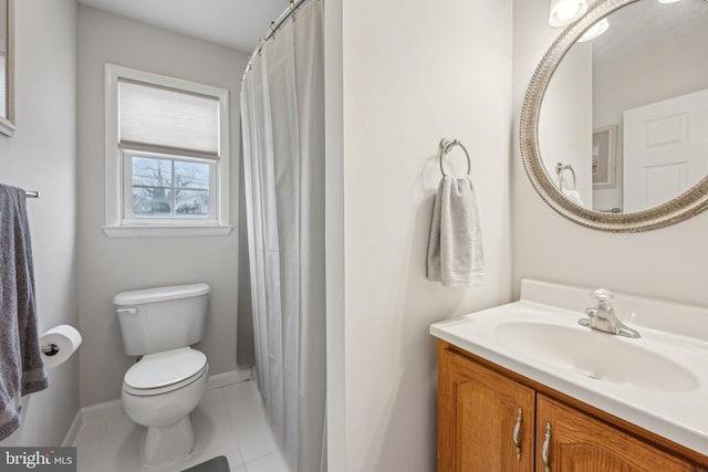 full bath featuring curtained shower, toilet, vanity, baseboards, and tile patterned floors