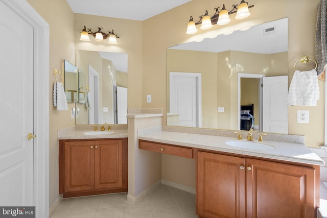 bathroom with vanity and tile patterned floors