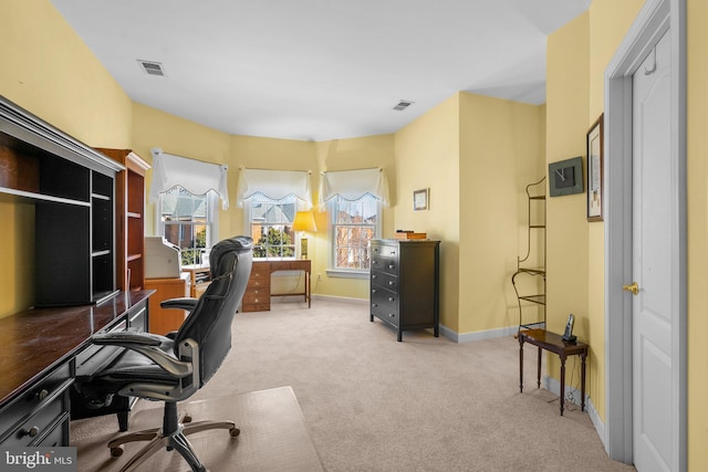 office area featuring light colored carpet