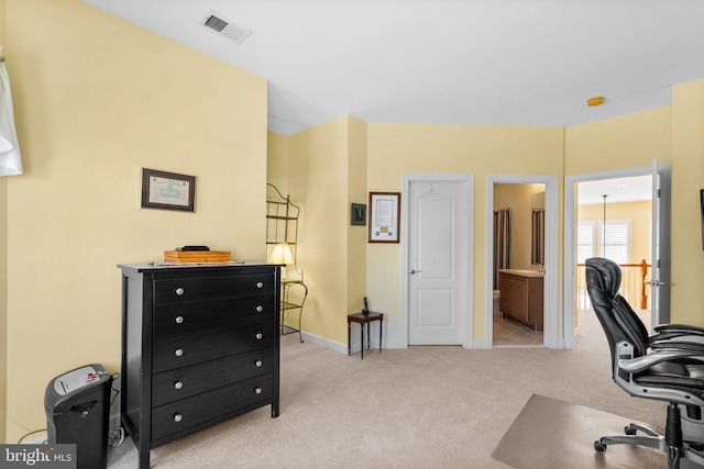 office area featuring light colored carpet