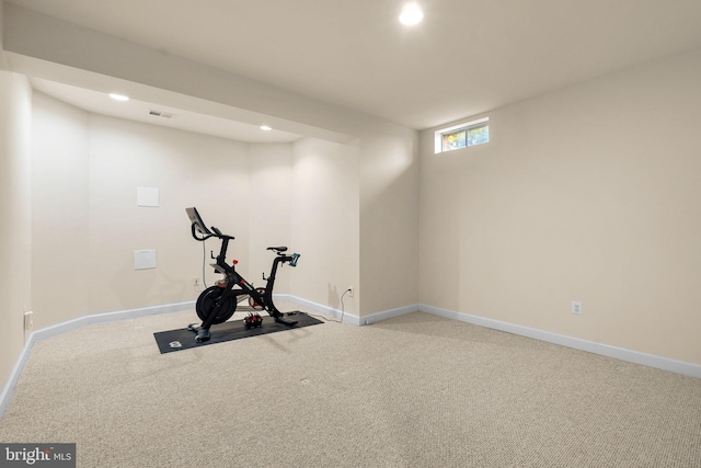 workout room with light carpet