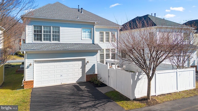 view of front property with a garage