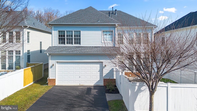 view of side of home with a garage