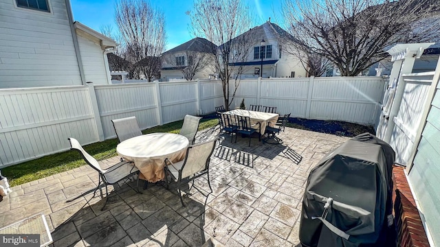 view of patio / terrace featuring a grill