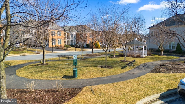 view of community with a gazebo and a lawn