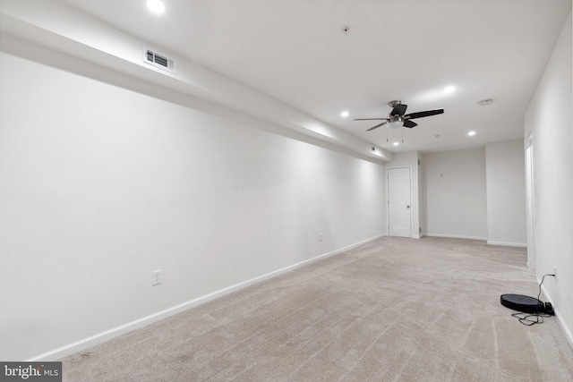 carpeted empty room with ceiling fan