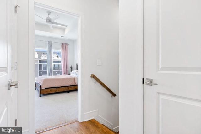 interior space with light hardwood / wood-style flooring and ceiling fan