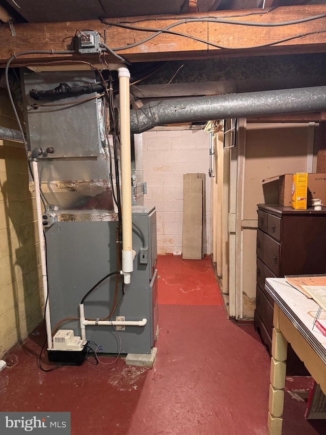 basement featuring heating unit