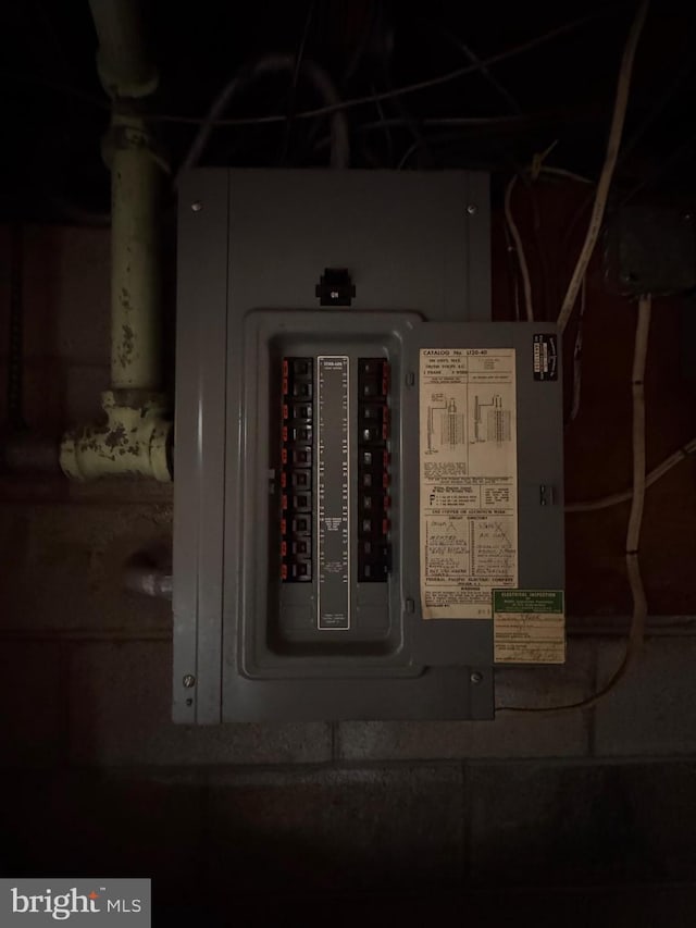 utility room featuring electric panel