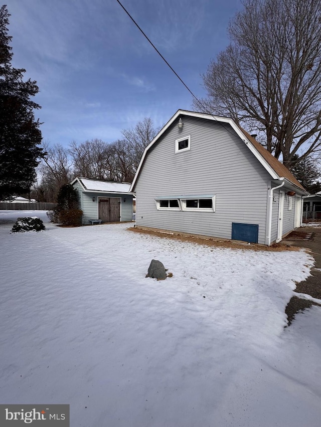 view of snow covered property