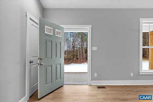 foyer with light wood-type flooring