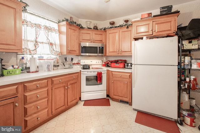 kitchen with white appliances