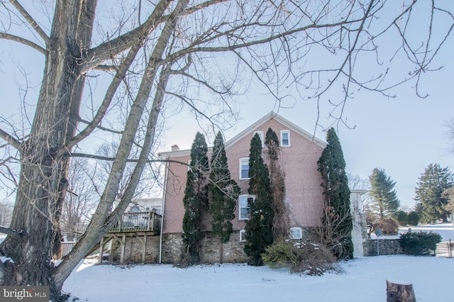 view of snow covered property