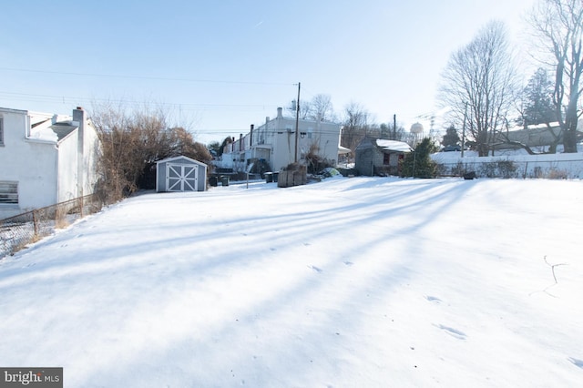 view of yard covered in snow