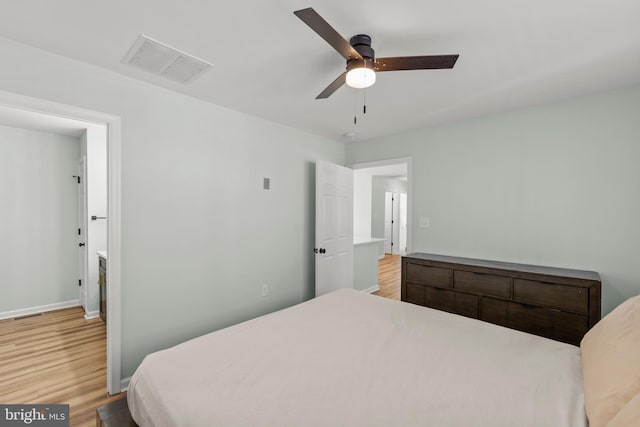 bedroom featuring ceiling fan and light wood-type flooring