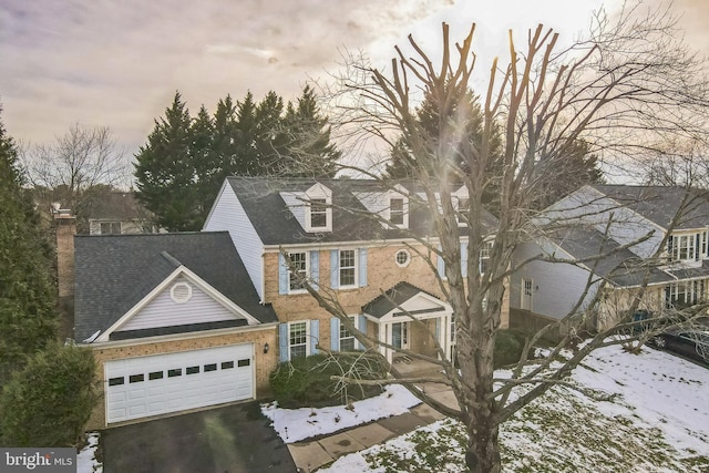 view of front of property featuring a garage