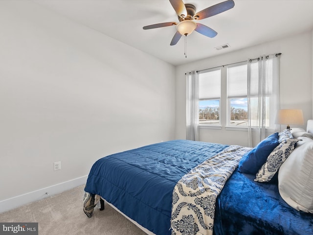 bedroom with ceiling fan and carpet flooring