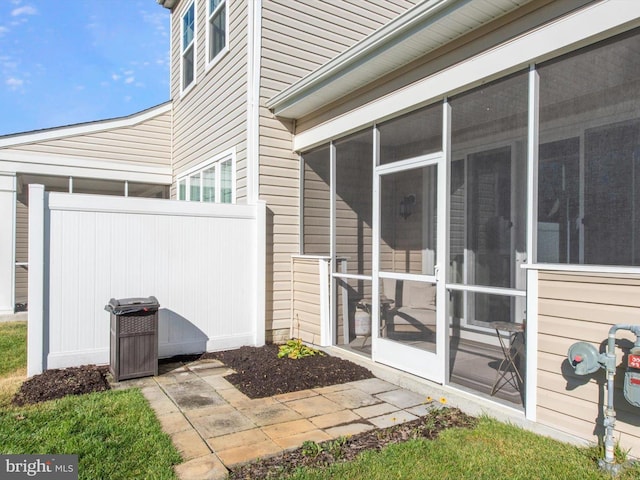 exterior space with a sunroom