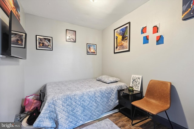 bedroom featuring hardwood / wood-style flooring