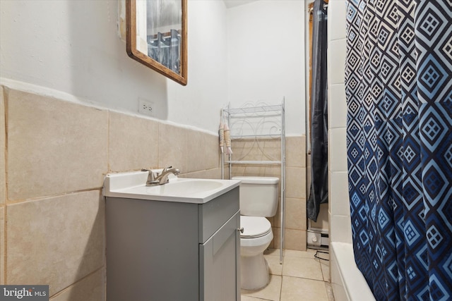 full bathroom with toilet, vanity, tile patterned flooring, tile walls, and shower / bath combination with curtain