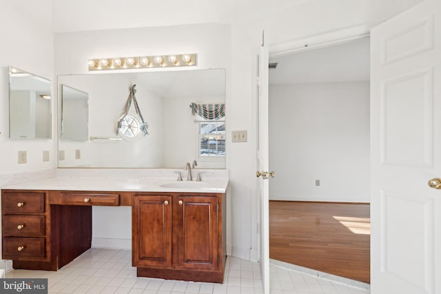 bathroom featuring vanity and tile patterned flooring