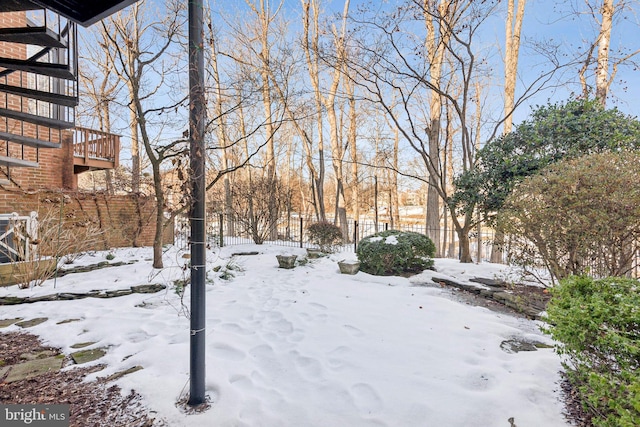 view of snowy yard