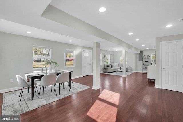 dining area featuring dark wood finished floors, recessed lighting, and baseboards