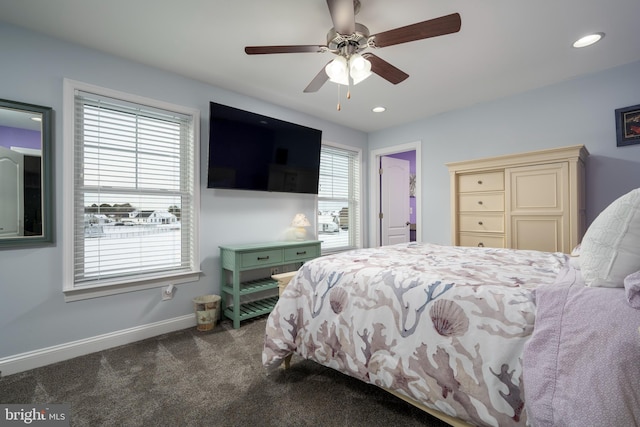 carpeted bedroom featuring ceiling fan