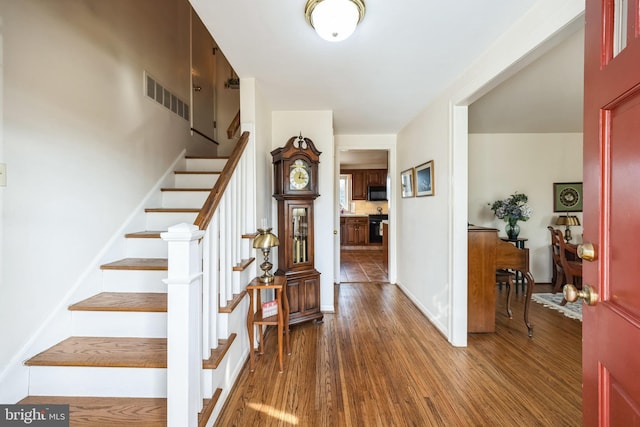 entryway featuring dark hardwood / wood-style floors