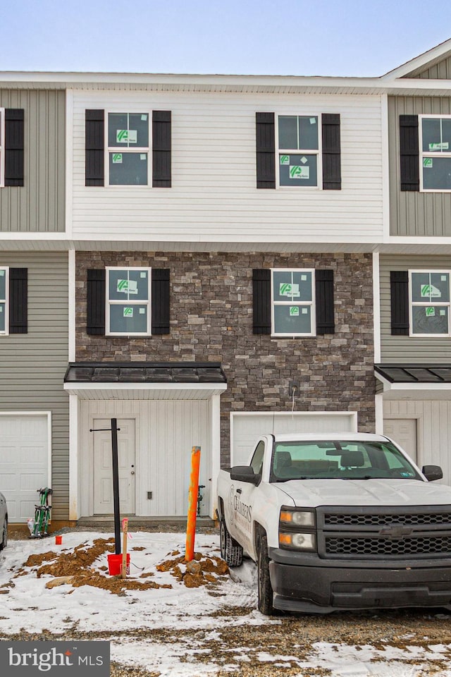 view of property featuring a garage