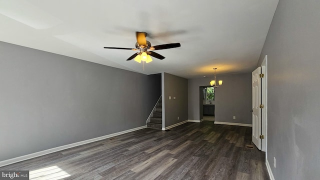 unfurnished room featuring ceiling fan and dark wood-type flooring