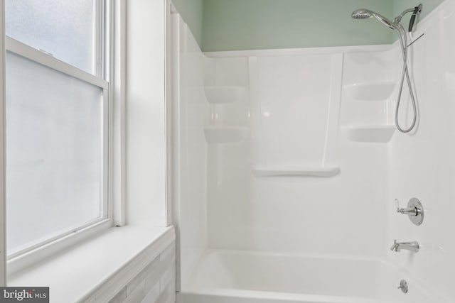 bathroom with shower / tub combination