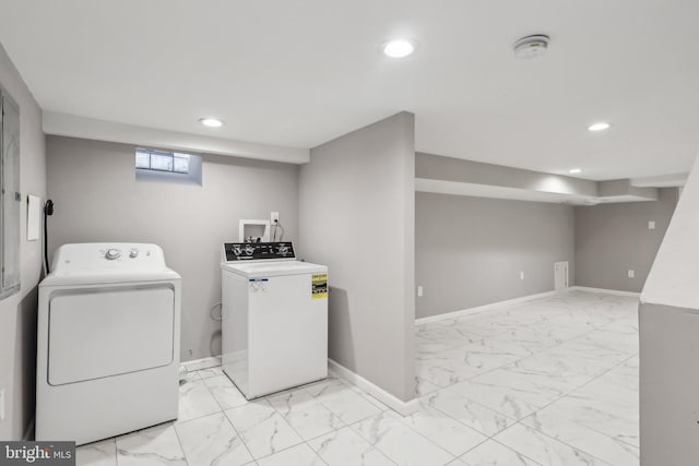 washroom featuring washing machine and clothes dryer