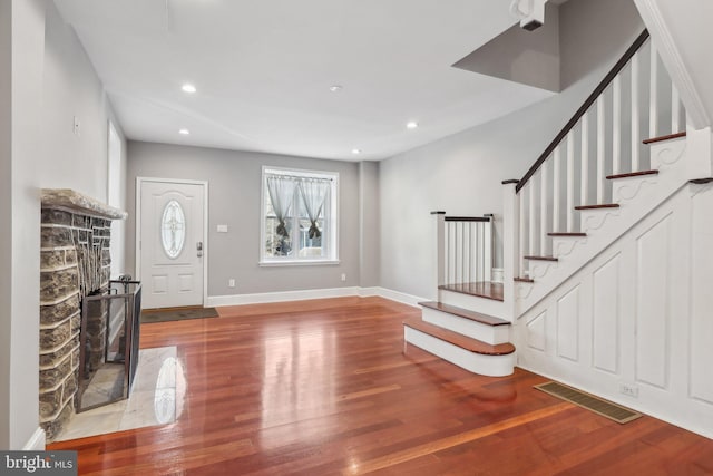 foyer entrance featuring wood-type flooring