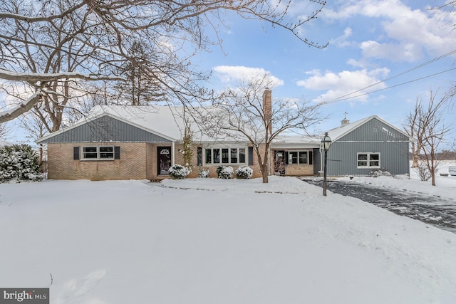 view of snow covered house