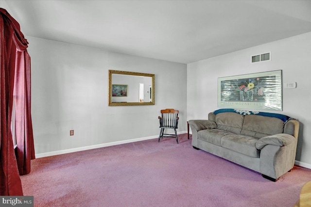 living room featuring light carpet