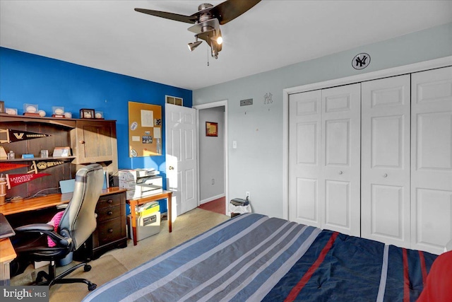 bedroom featuring ceiling fan and a closet