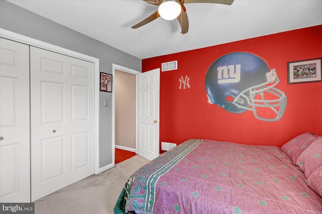 bedroom featuring ceiling fan, carpet flooring, and a closet