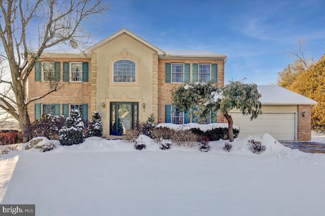 view of front of home with a garage