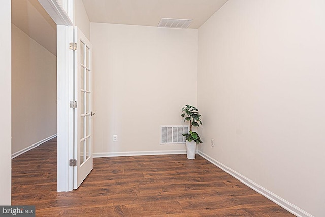 interior space with dark hardwood / wood-style flooring