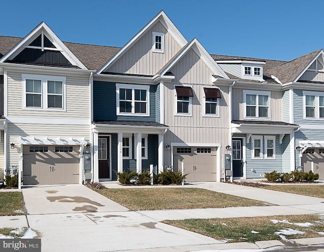 multi unit property featuring a garage