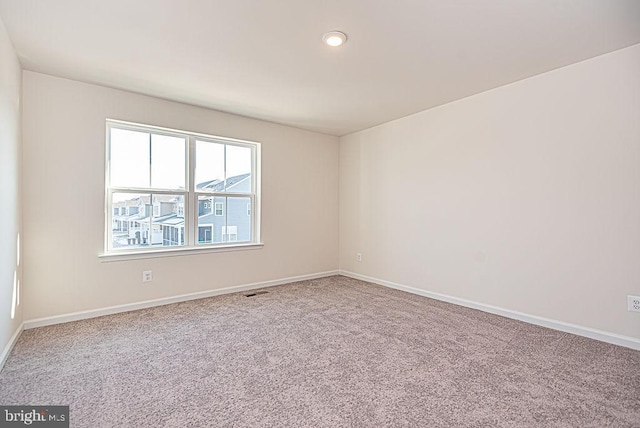 view of carpeted spare room