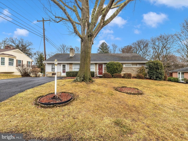 view of front of home with a front yard