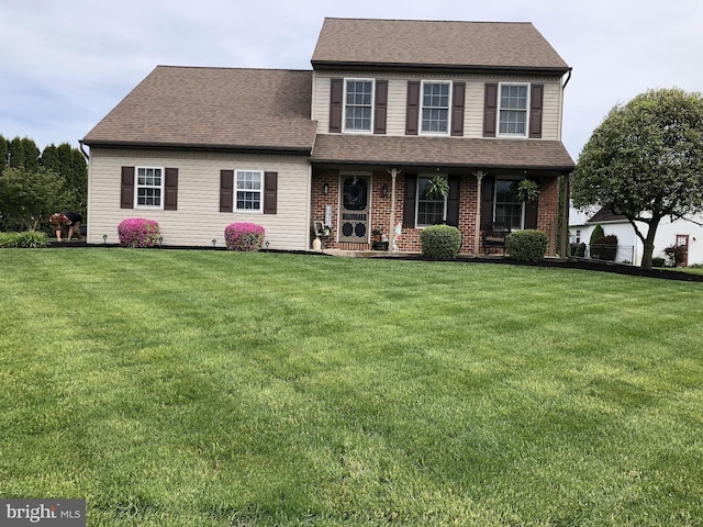 view of front of property with a front lawn