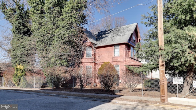 view of front of home with fence