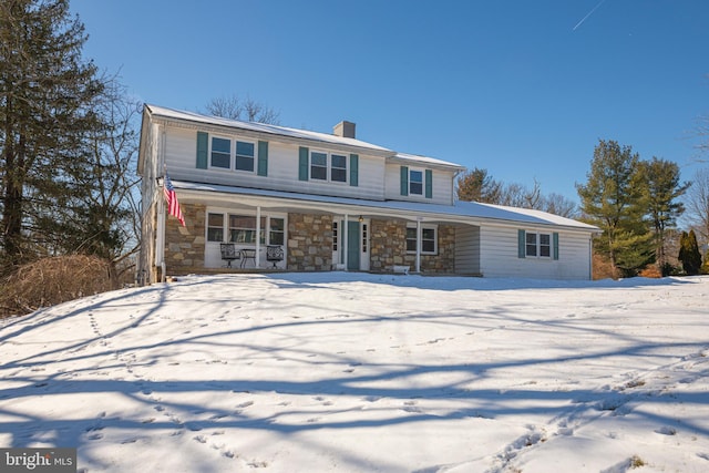 view of front property featuring covered porch