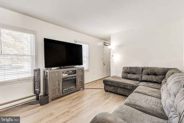 living room with light hardwood / wood-style floors