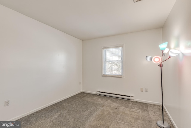 unfurnished room featuring a baseboard radiator and light colored carpet