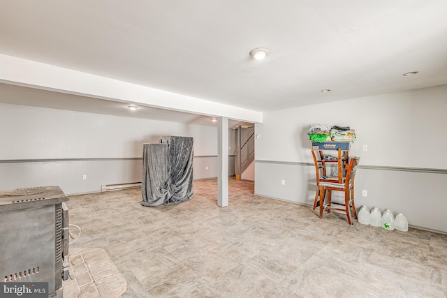 basement with a baseboard heating unit