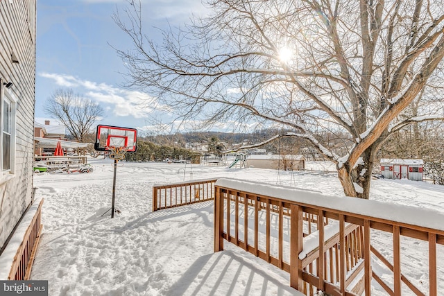 view of snow covered deck